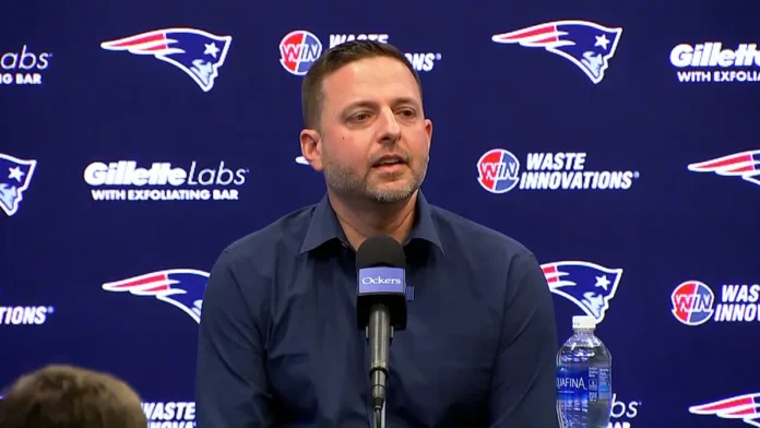 This image is about Eliot-Wolf He is holding a press conference with the media
