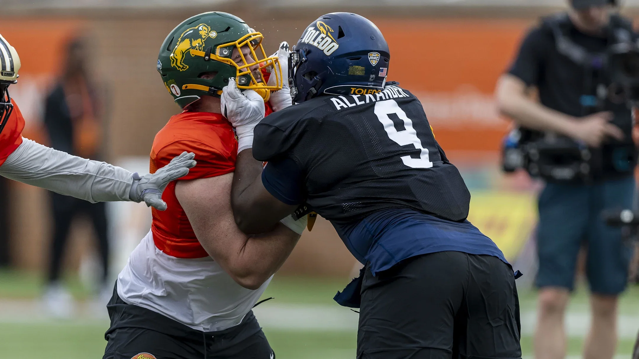 This image is about two nfl player fighting with each others