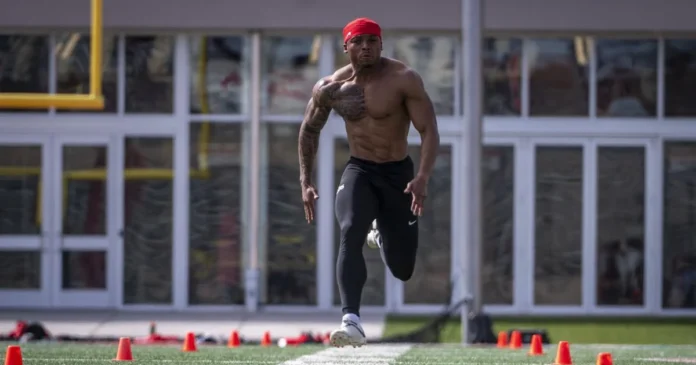 this image about nfl player running